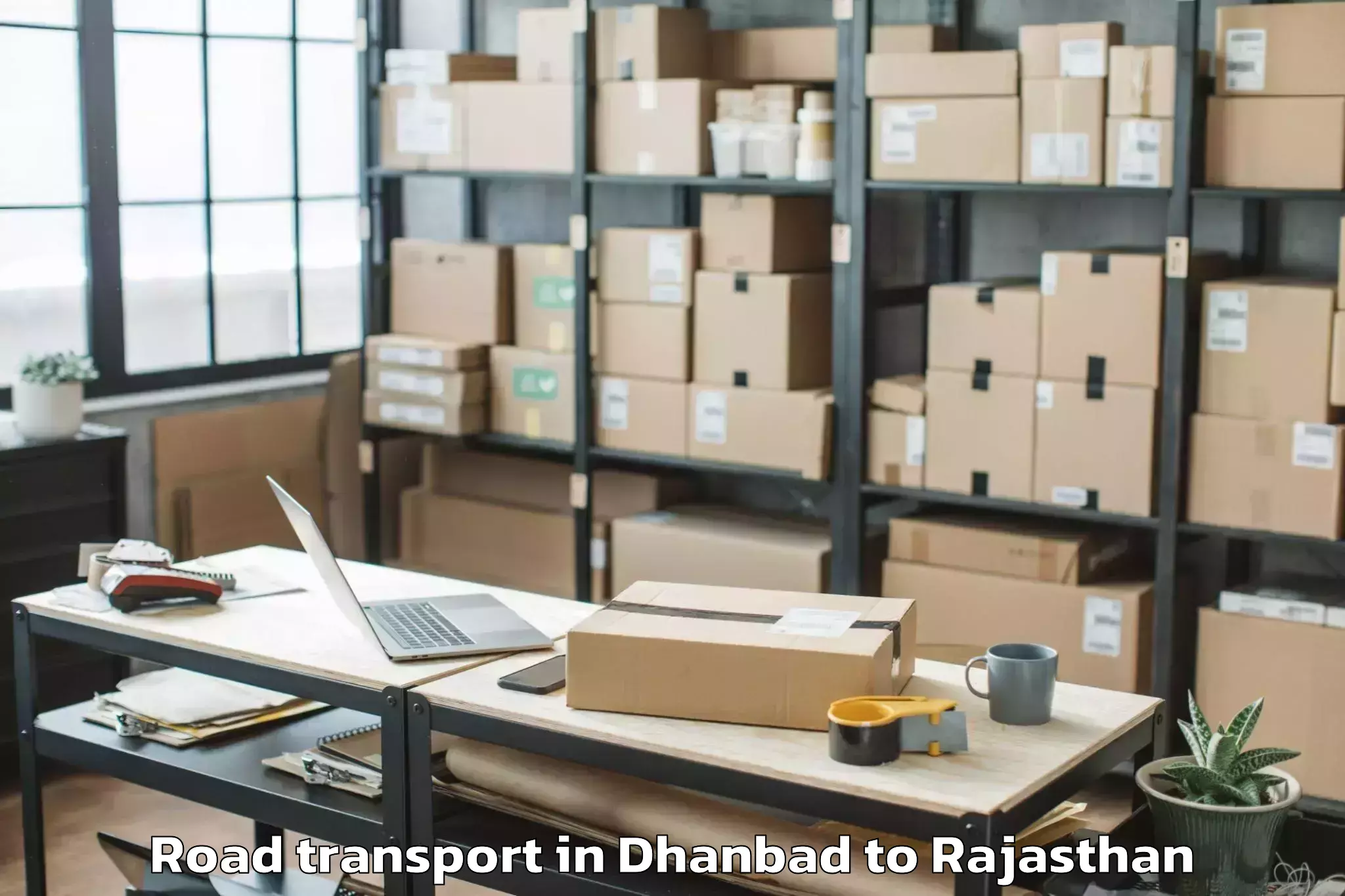 Dhanbad to Chauth Ka Barwara Road Transport Booking